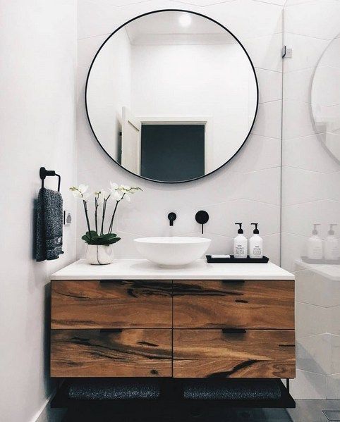 tiny bathroom with big mirror
